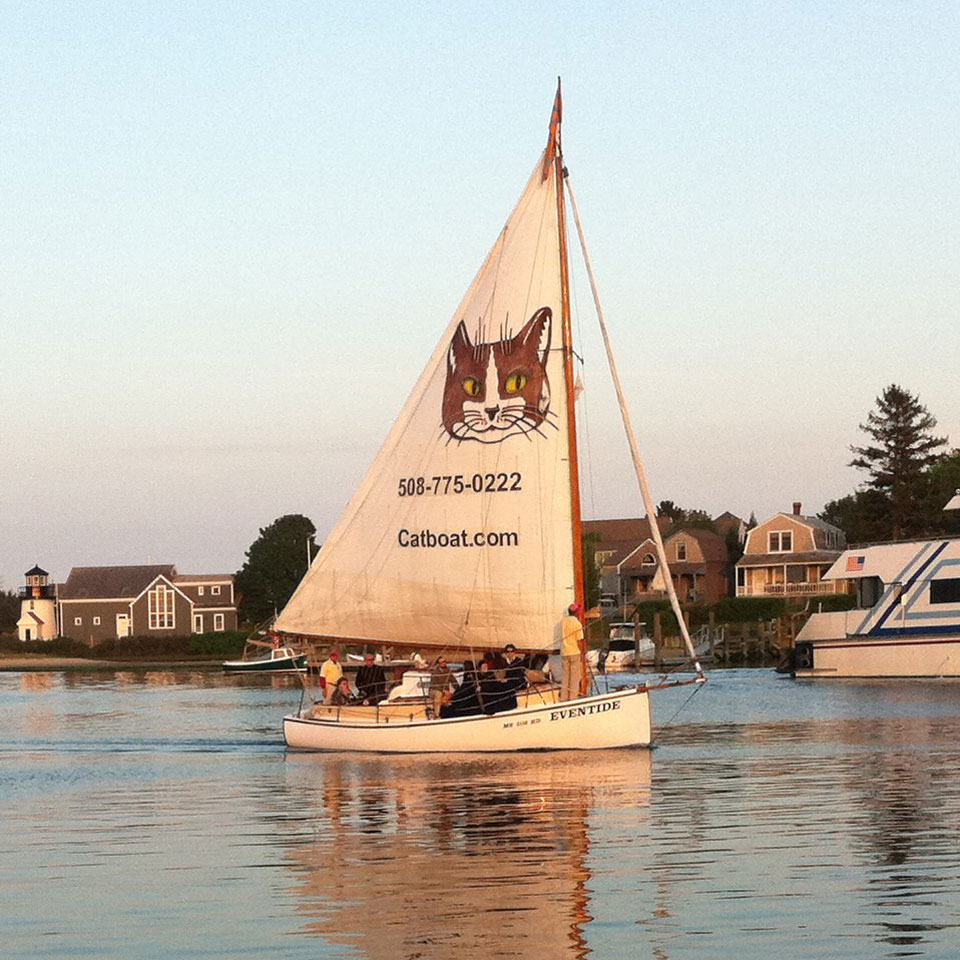 The catboat Eventide sailing in Hyannis Harbor